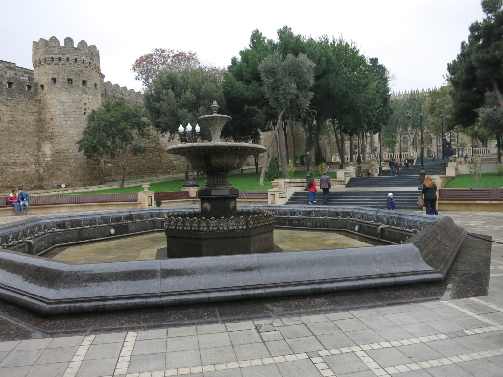 fountain with Baku city wall in background